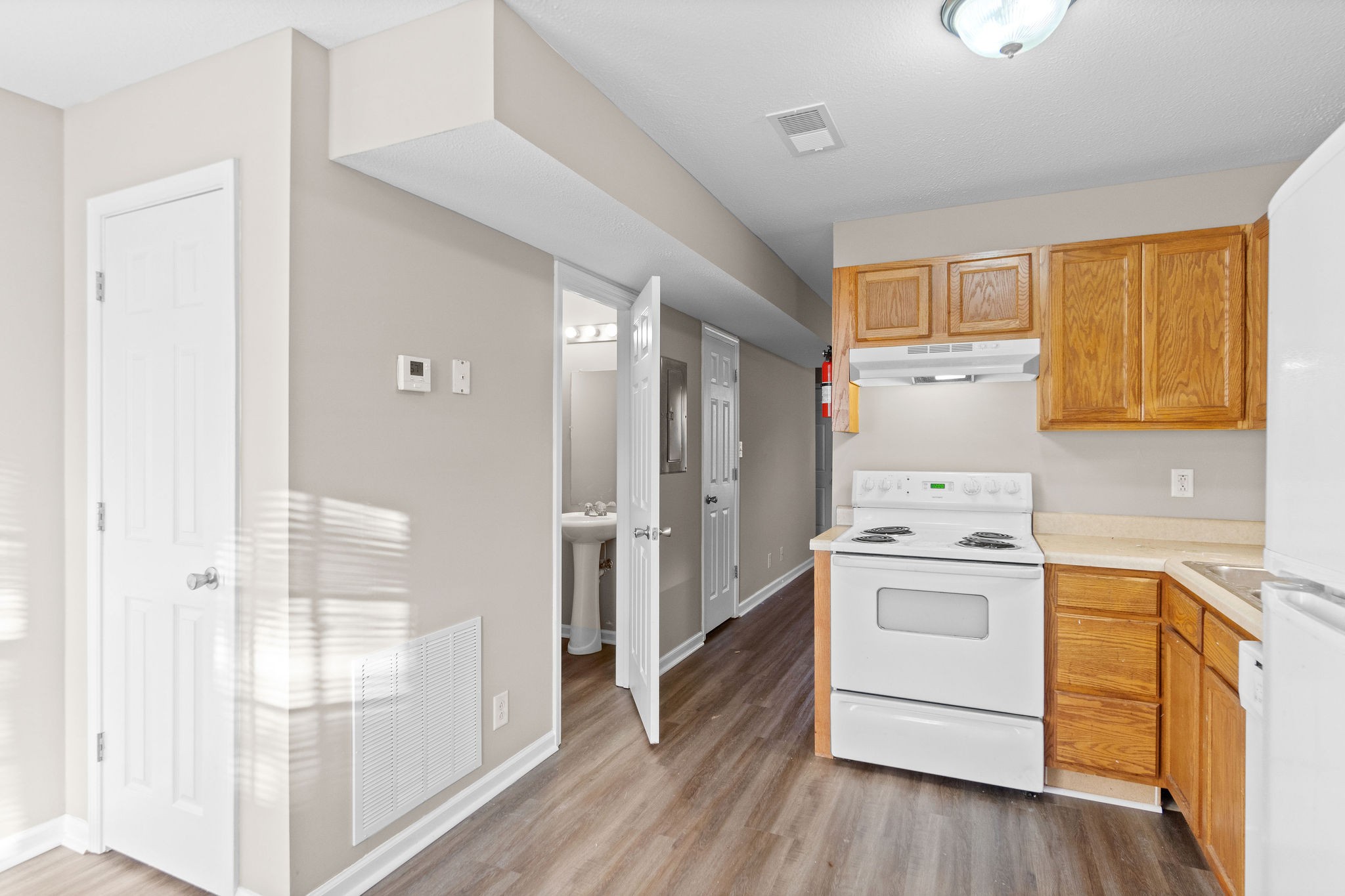 804 Golf View Place, Unit B Clarksville, TN 37043 - Photo 13 of 24 a view of a kitchen with appliances and cabinets