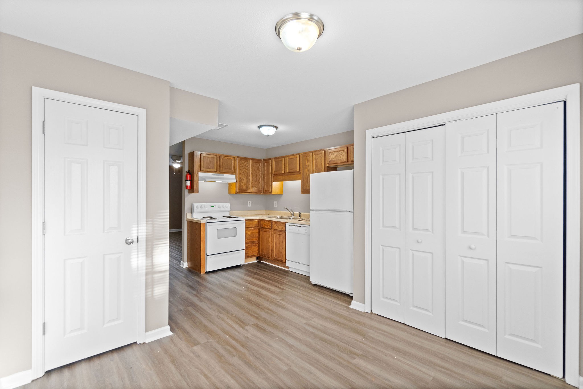 804 Golf View Place, Unit B Clarksville, TN 37043 - Photo 16 of 24 a view of a kitchen with wooden floor and electronic appliances