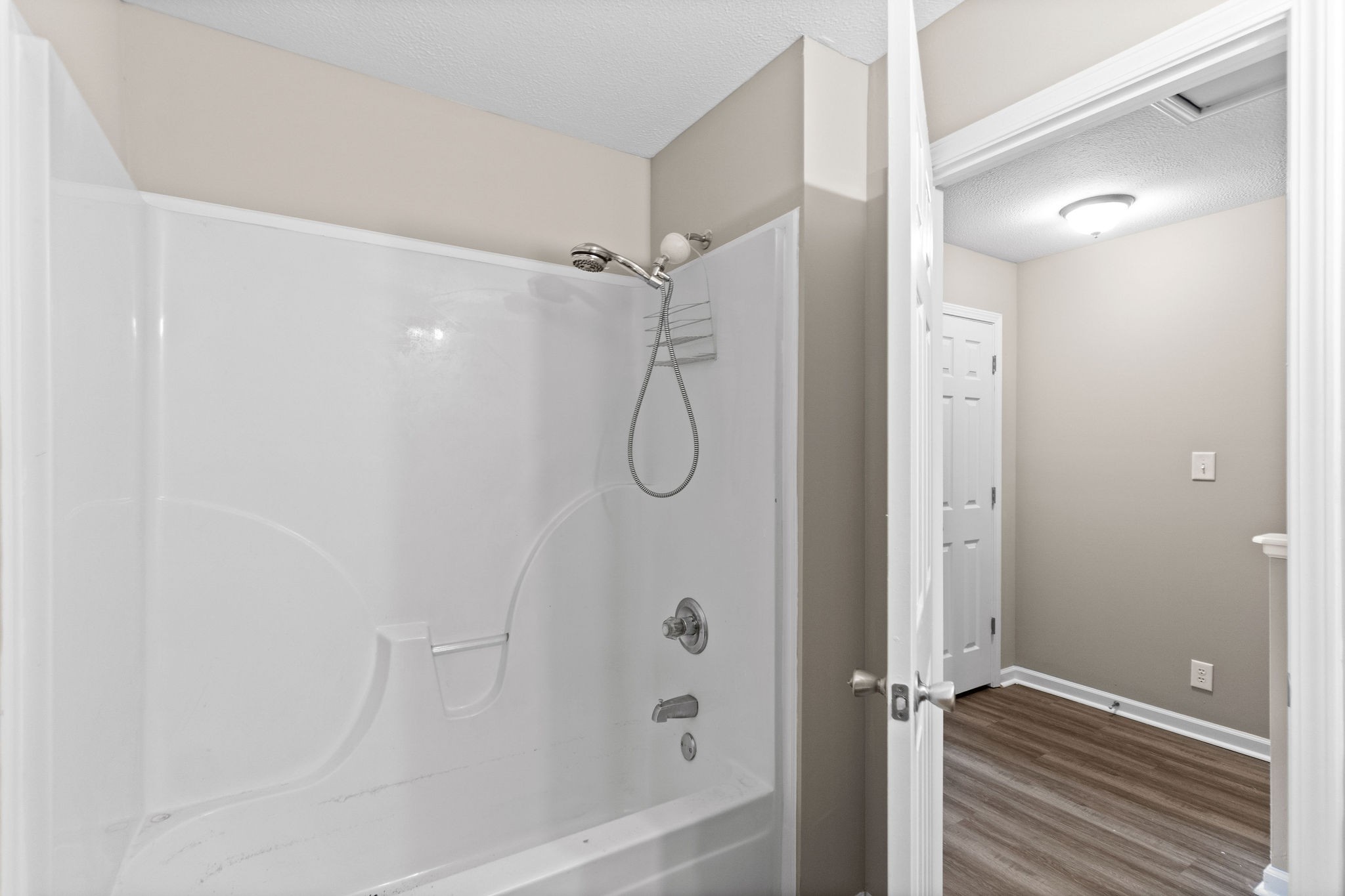 804 Golf View Place, Unit B Clarksville, TN 37043 - Photo 21 of 24 a bathroom with a glass shower door