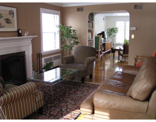 14 Plowgate Road Brookline, MA 02467 - Photo 6 of 6 a living room with furniture and a fireplace