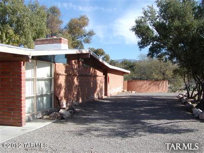 2825 North Indian Ruins Road Tucson, AZ 85715 - Photo 2 of 3 a view of a house with a yard