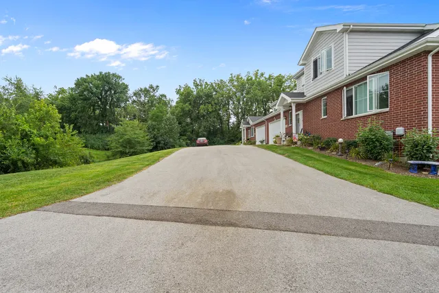 a backyard of a house with lots of green space