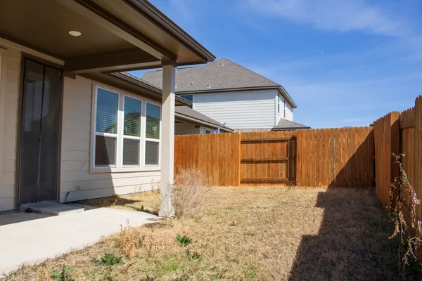 a front view of a house with a outdoor space