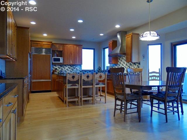 37285 Harrisville Road Calhan, CO 80808 - Photo 9 of 24 Gorgeous Kitchen with Large Eating Space