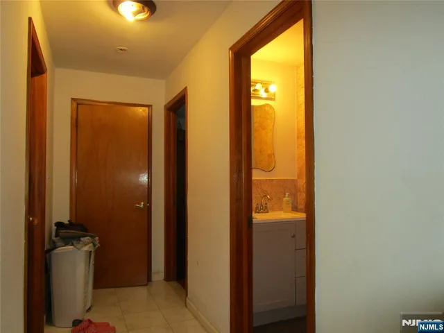 a view of a bathroom with a glass door