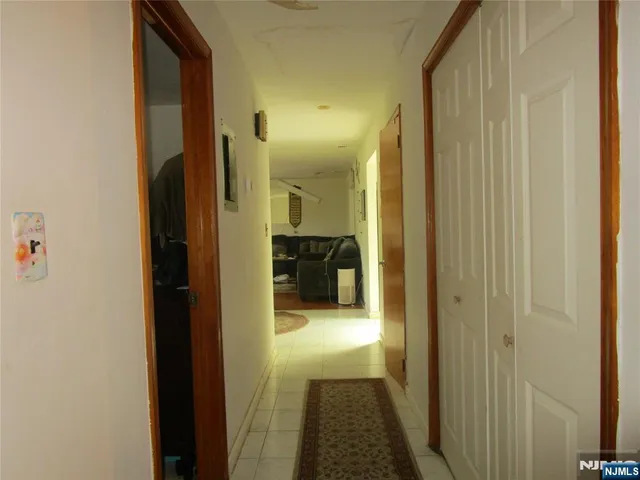 a view of a bathroom from a hallway