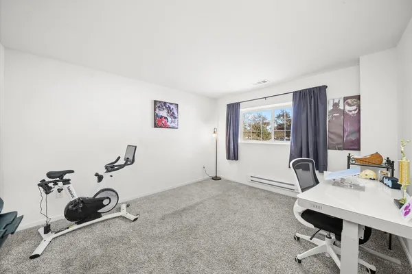 a view of workspace with gym equipment