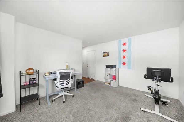 a view of a workspace with furniture