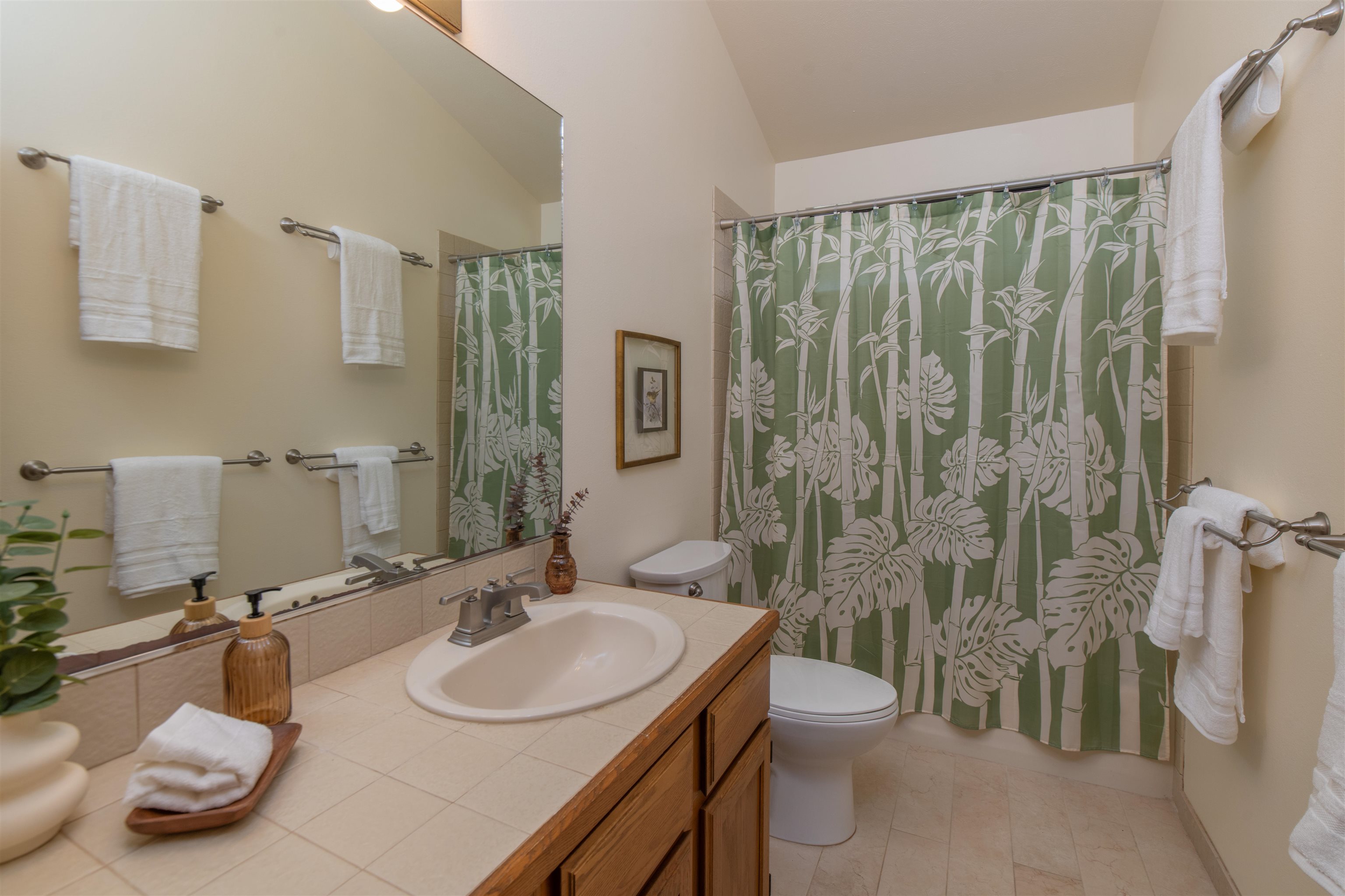 358 Holopuni Road Kula, HI 96790 - Photo 17 of 49 a bathroom with a granite countertop sink toilet and shower