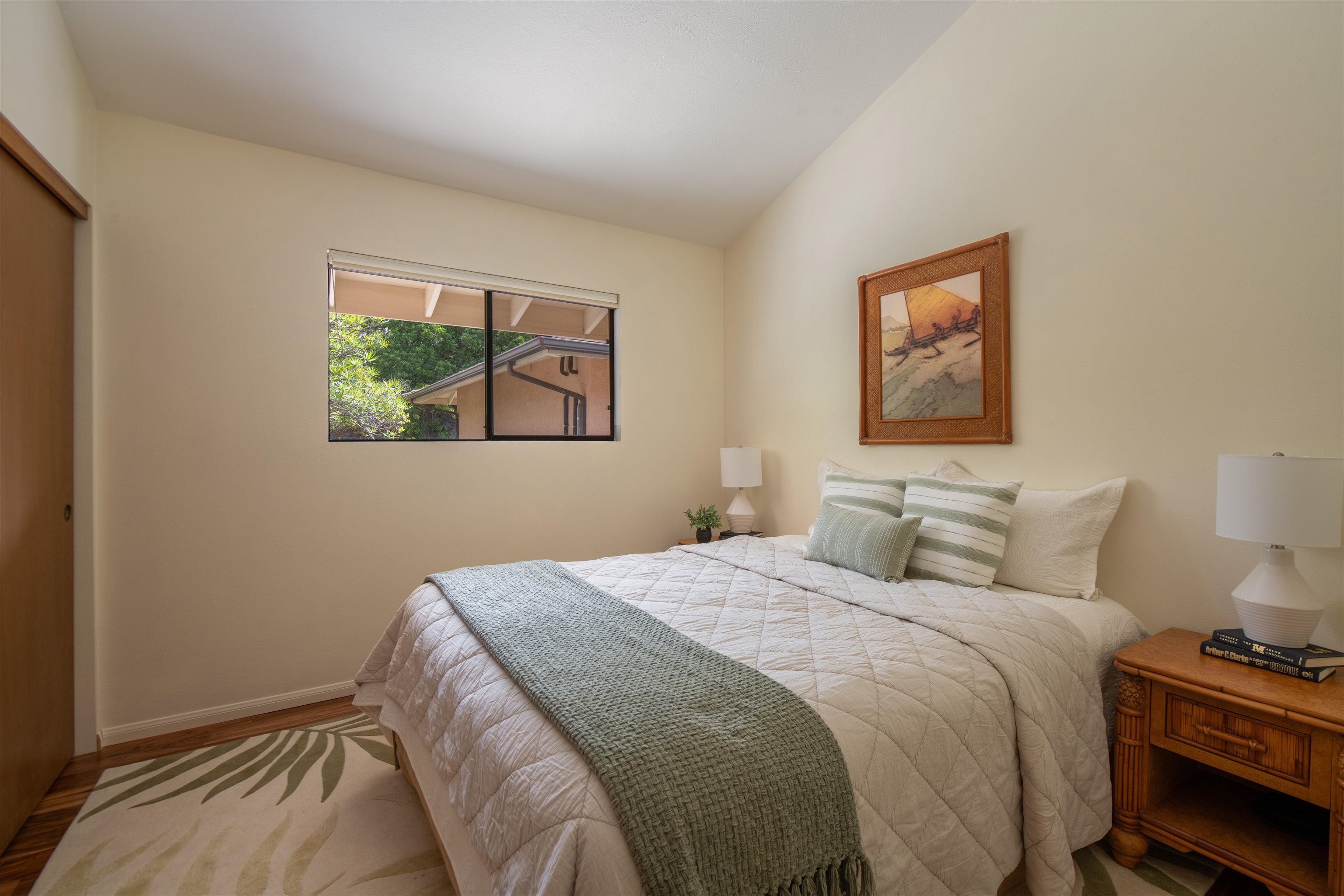 358 Holopuni Road Kula, HI 96790 - Photo 20 of 49 a bedroom with a bed and a window