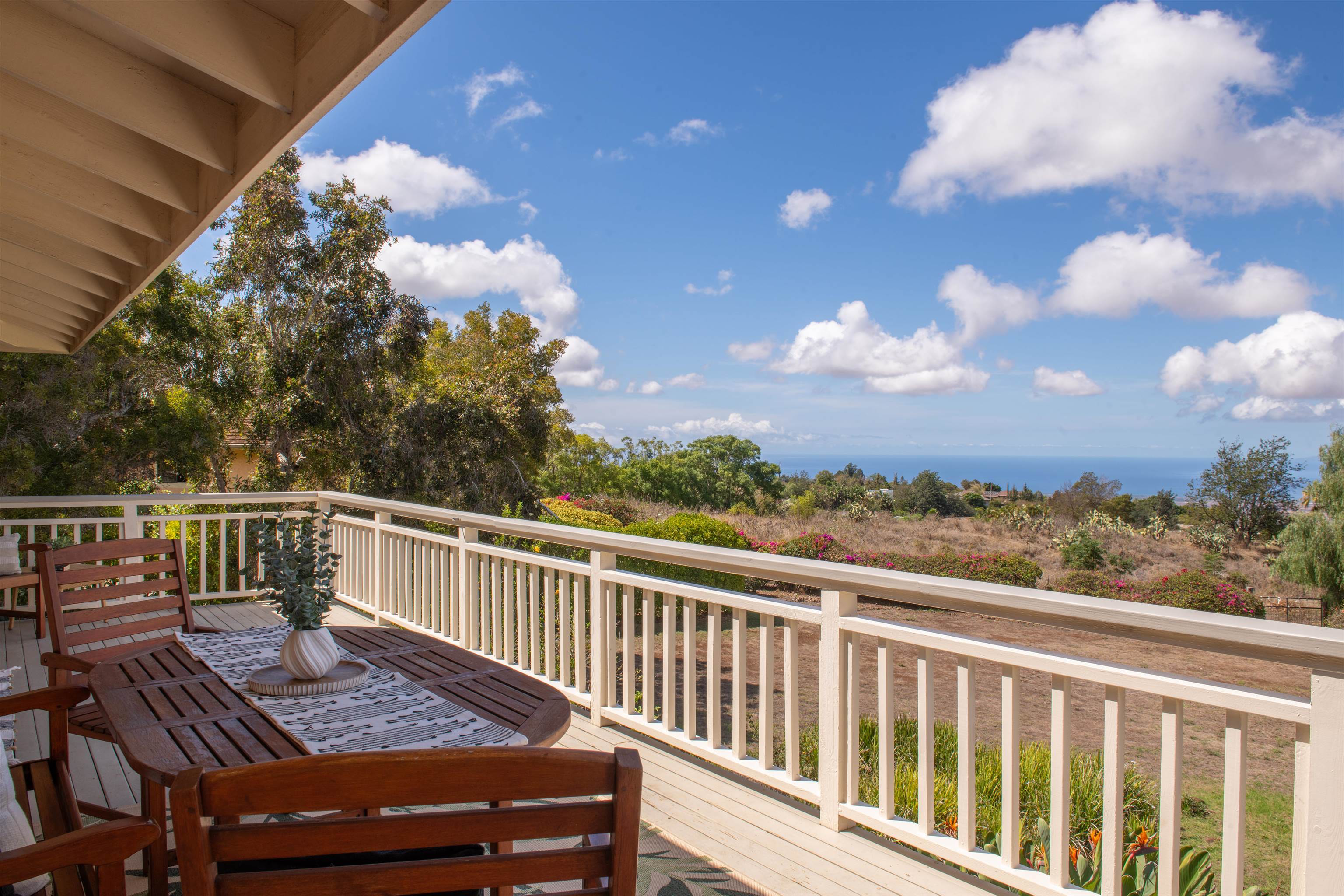 358 Holopuni Road Kula, HI 96790 - Photo 23 of 49 a view of a chairs and table in the balcony
