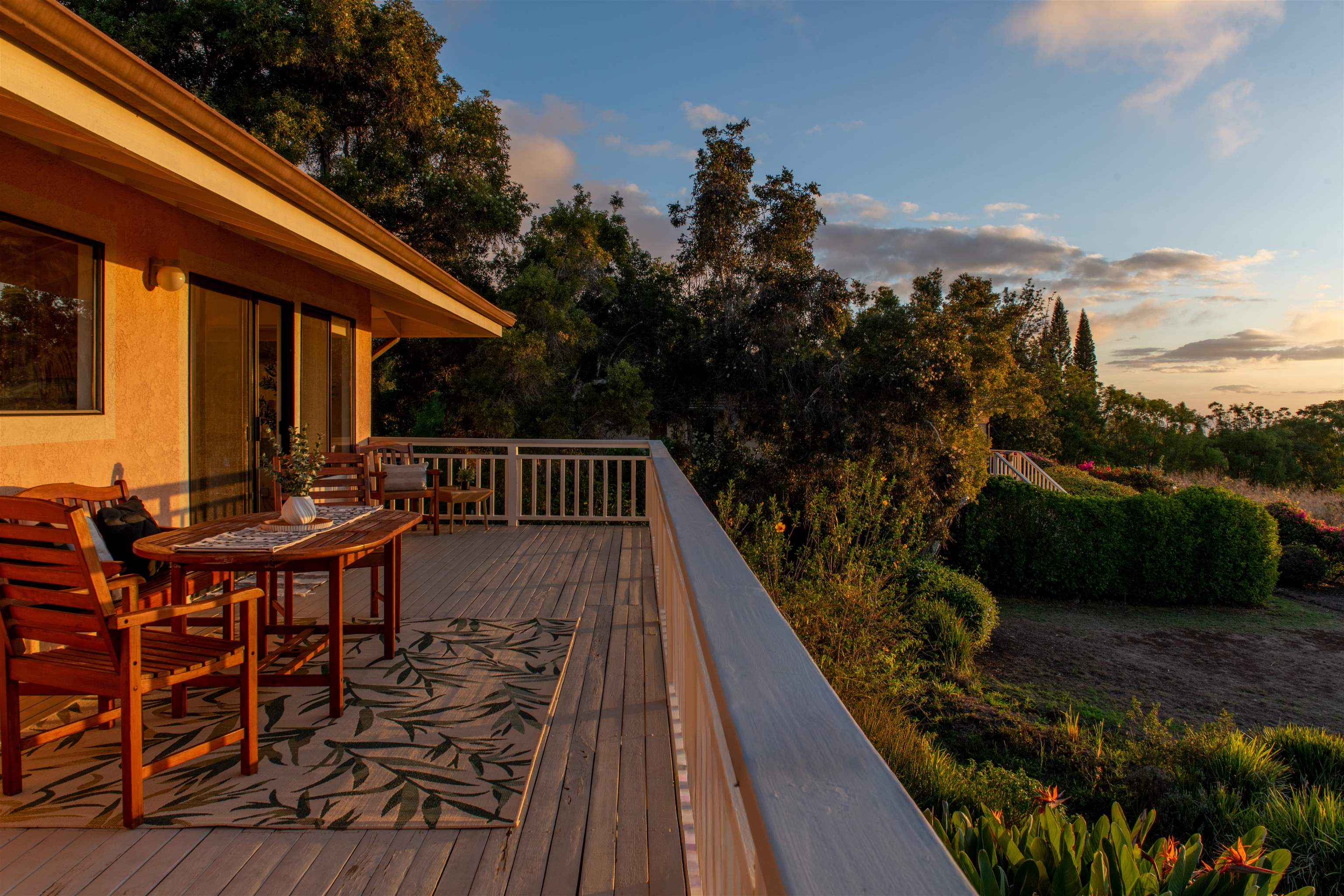 358 Holopuni Road Kula, HI 96790 - Photo 48 of 49 a view of balcony with wooden floor and outdoor seating