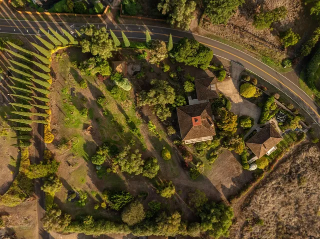 a view of balcony with wooden floor and outdoor seating