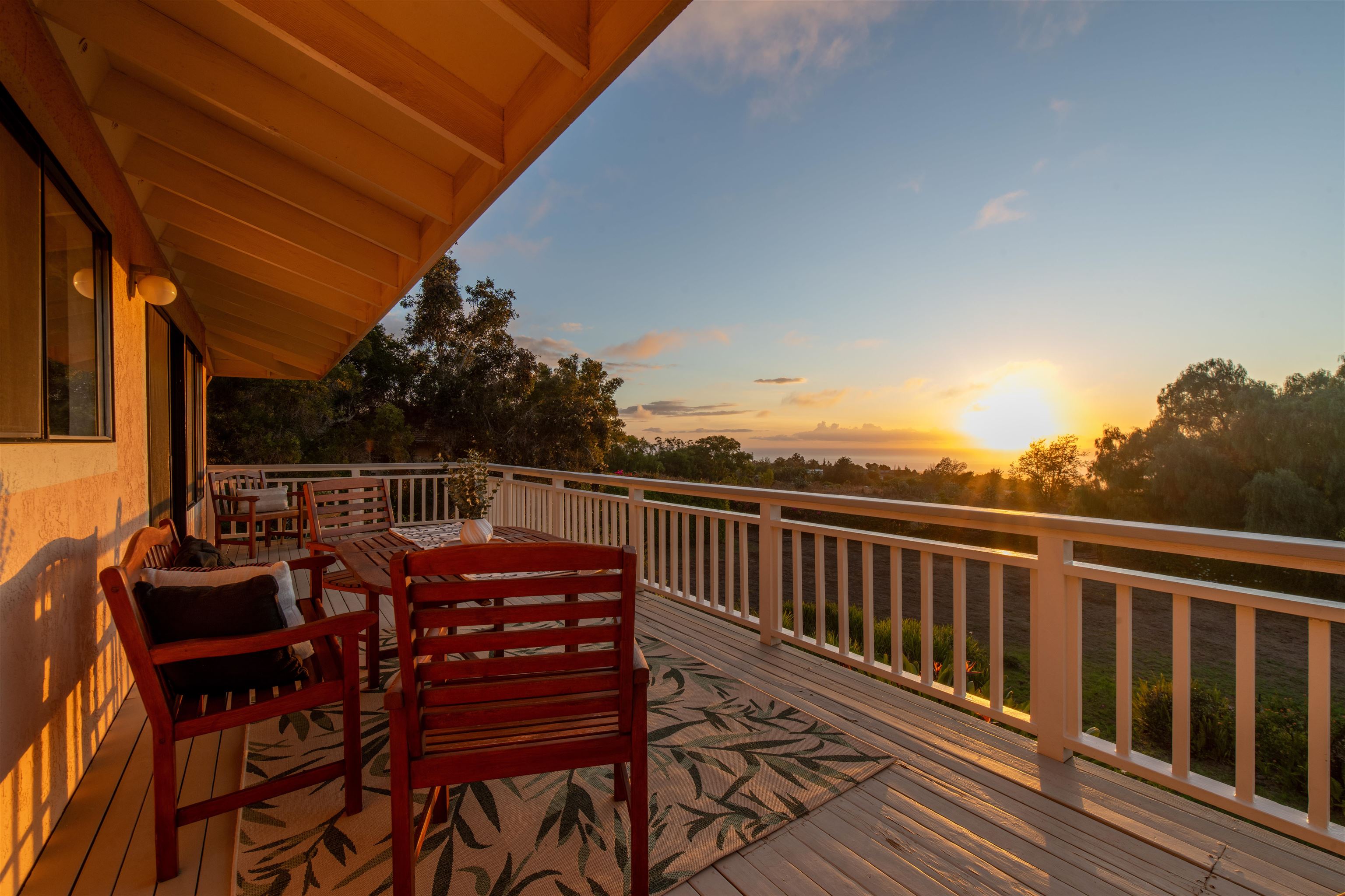 358 Holopuni Road Kula, HI 96790 - Photo 6 of 49 a view of balcony with wooden floor and outdoor seating