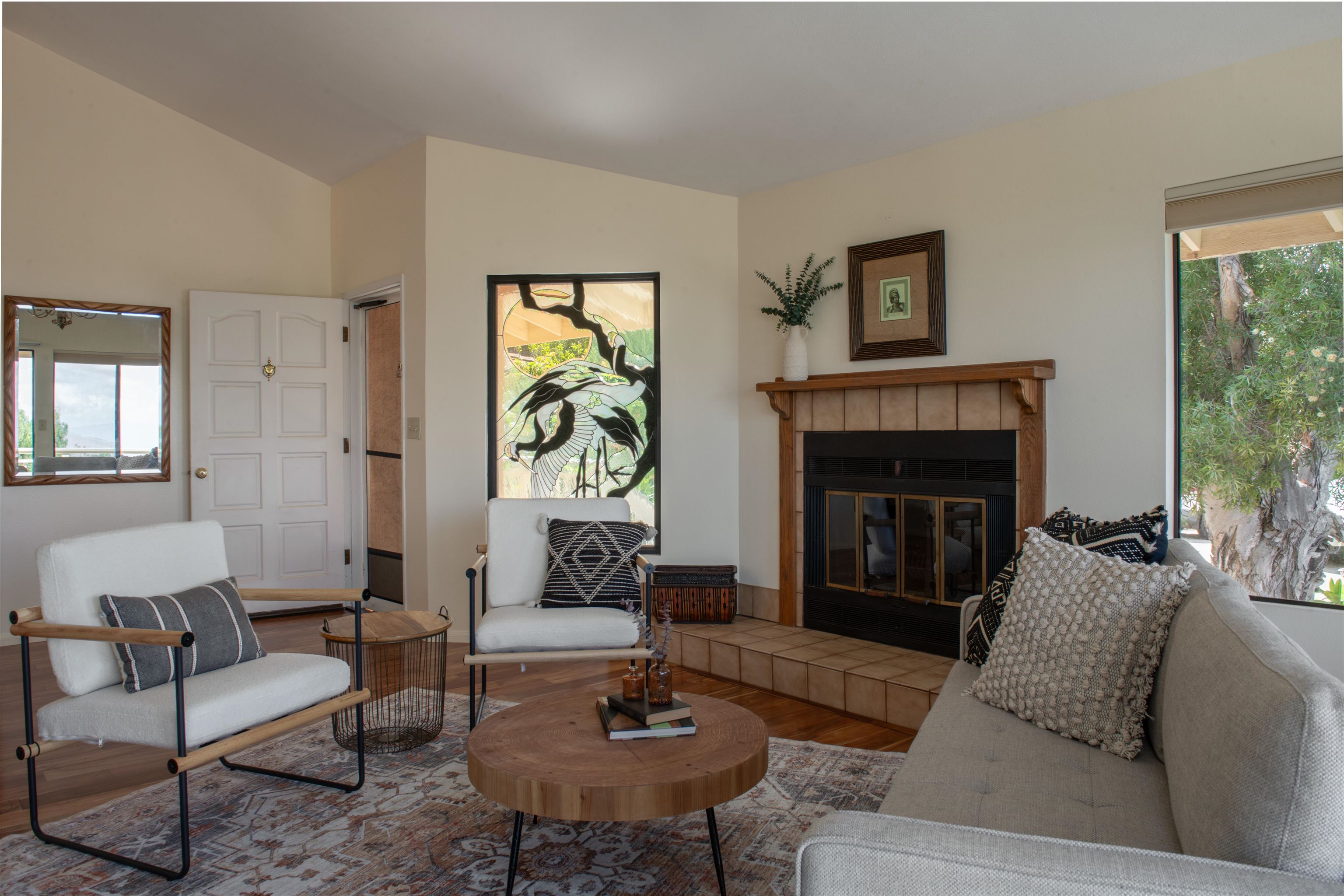 358 Holopuni Road Kula, HI 96790 - Photo 7 of 49 a living room with furniture and a fireplace