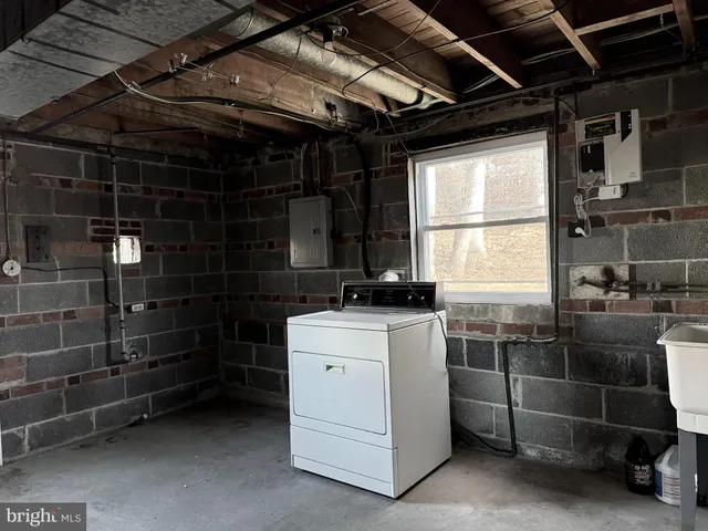 a storage room with washer and dryer
