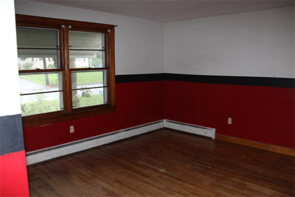 65 Gilbert Avenue Springfield, MA 01119 - Photo 7 of 7 a view of room with window and wooden floor