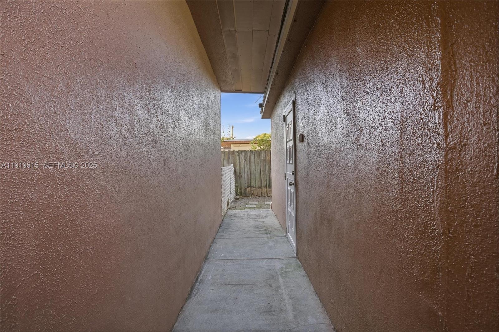 2445 Southwest 18th Street, Unit 5 Miami, FL 33145 - Photo 3 of 10 a view of a pathway