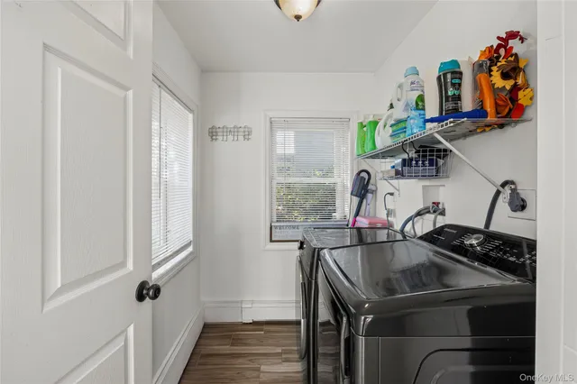 a bathroom with a sink and a window