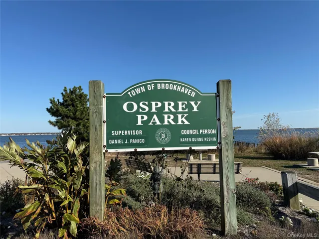 a view of garage with cars