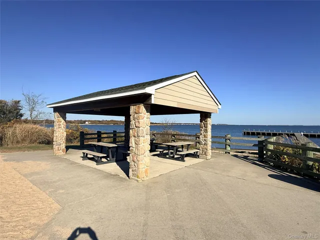 a view of a yard covered in snow