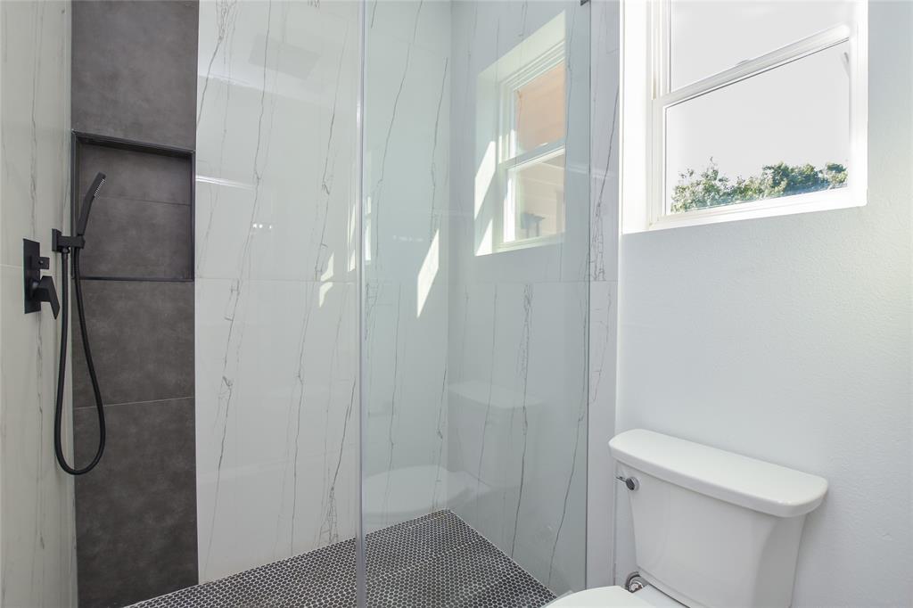 7103 Bennett Avenue, Unit 1 Austin, TX 78752 - Photo 13 of 25 a bathroom with a shower