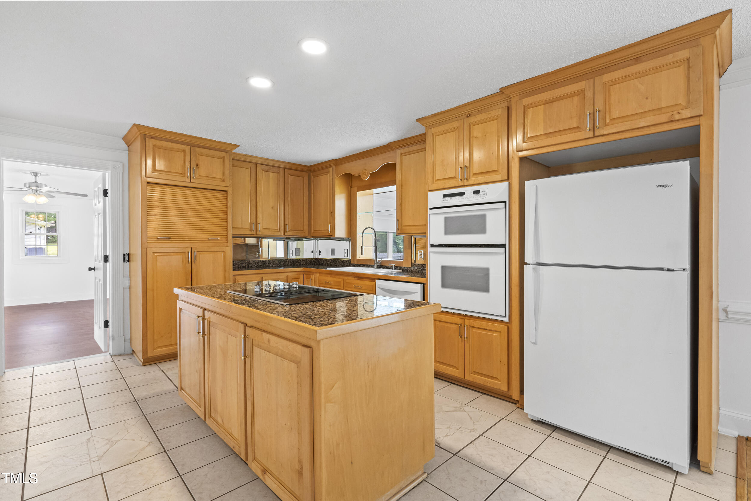 771 Brown Road Lillington, NC 27546 - Photo 10 of 37 a kitchen with stainless steel appliances granite countertop a refrigerator and a stove top oven