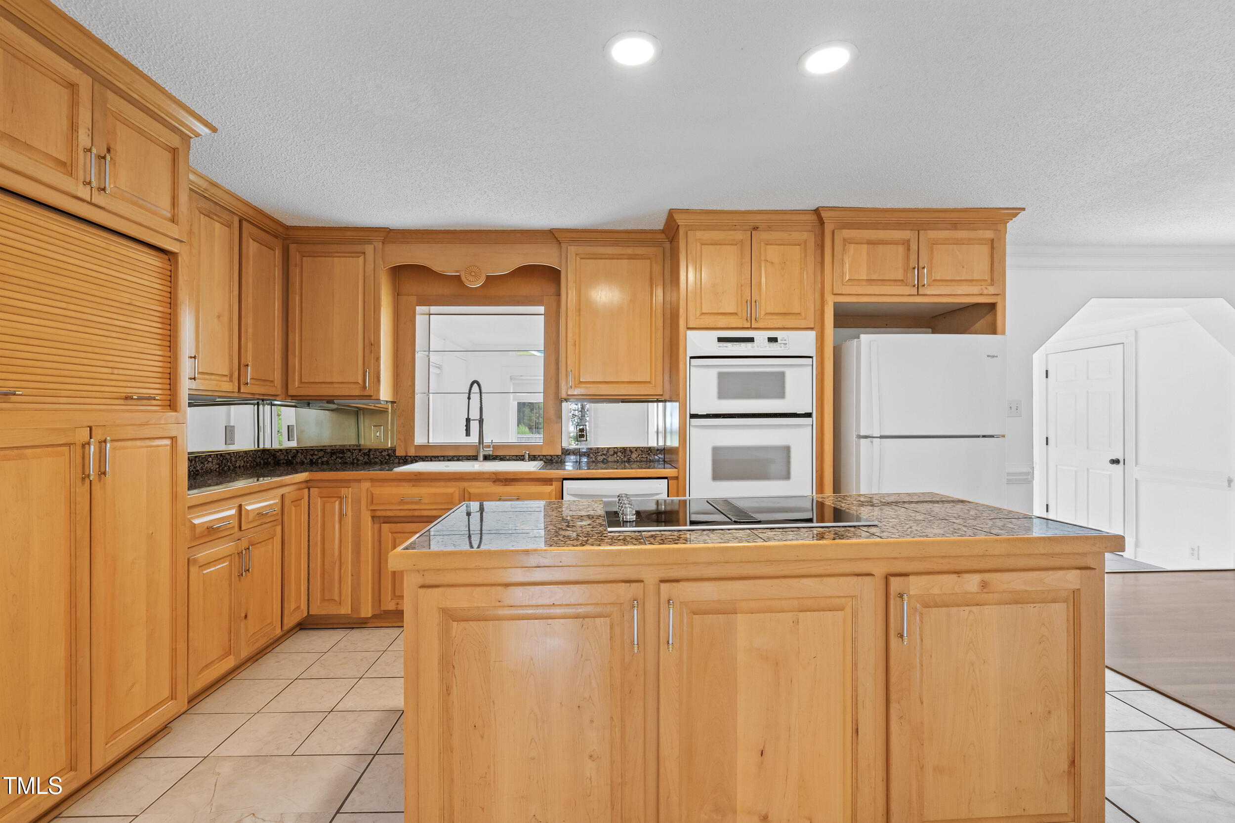 771 Brown Road Lillington, NC 27546 - Photo 11 of 37 a kitchen with stainless steel appliances granite countertop a sink and cabinets