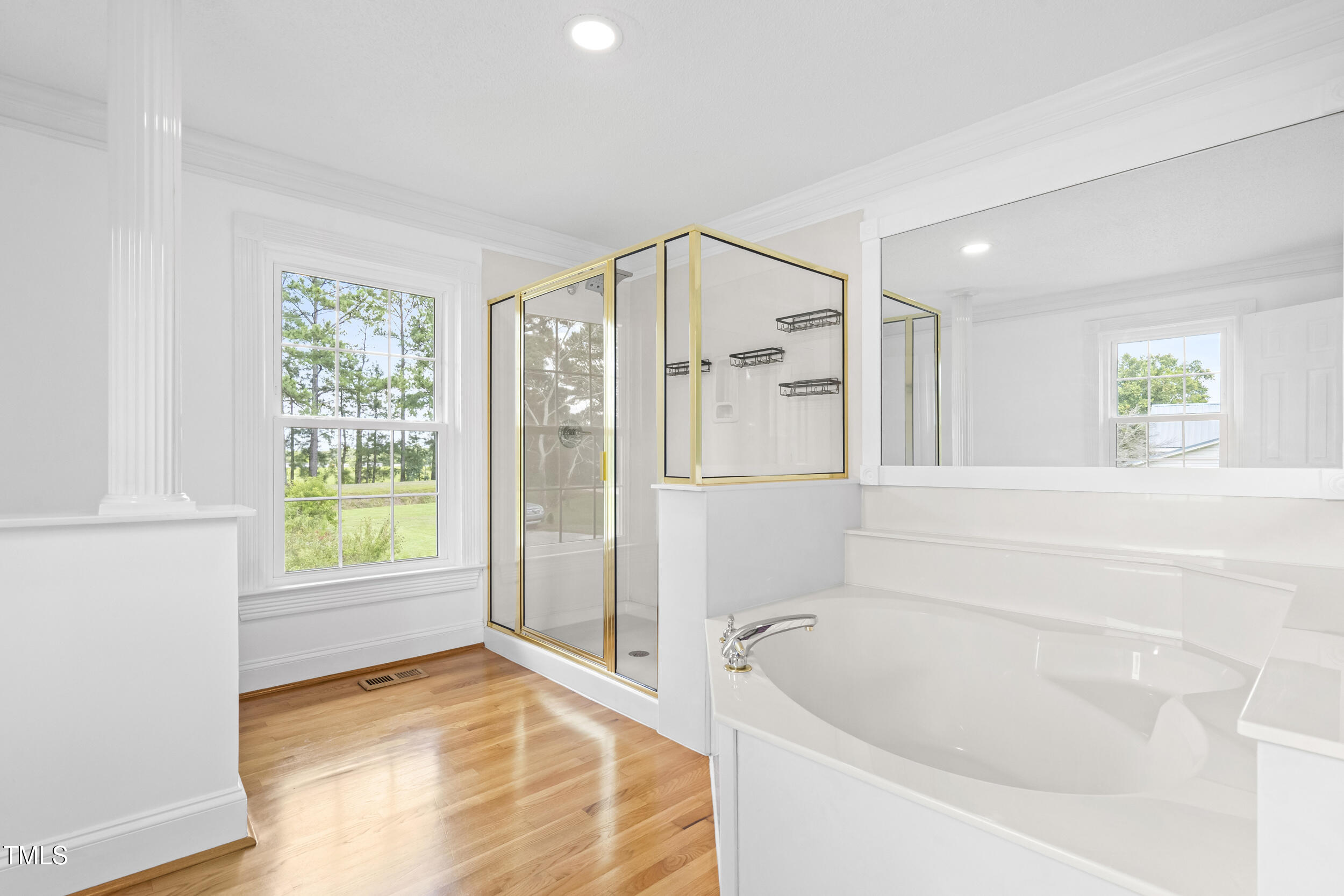 771 Brown Road Lillington, NC 27546 - Photo 22 of 37 a bathroom with a bathtub and a shower