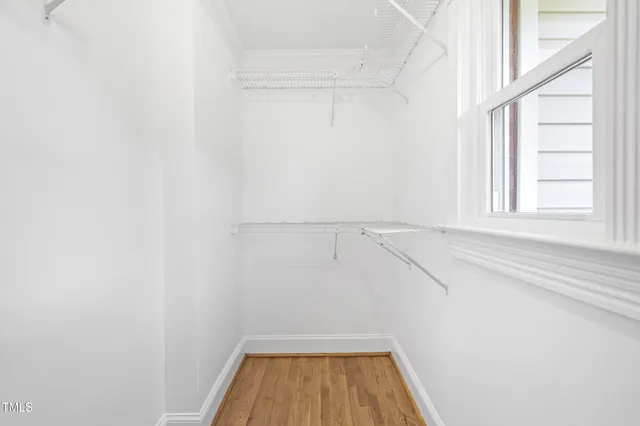 a view of a room with racks on the wall