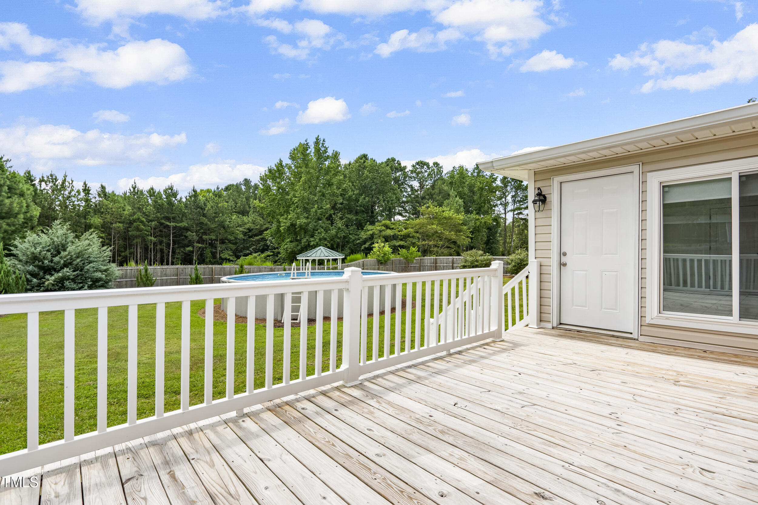 771 Brown Road Lillington, NC 27546 - Photo 32 of 37 a balcony with wooden floor and fence