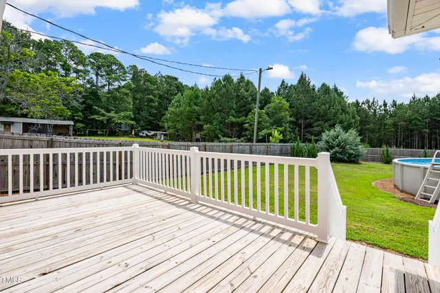 a balcony with wooden floor