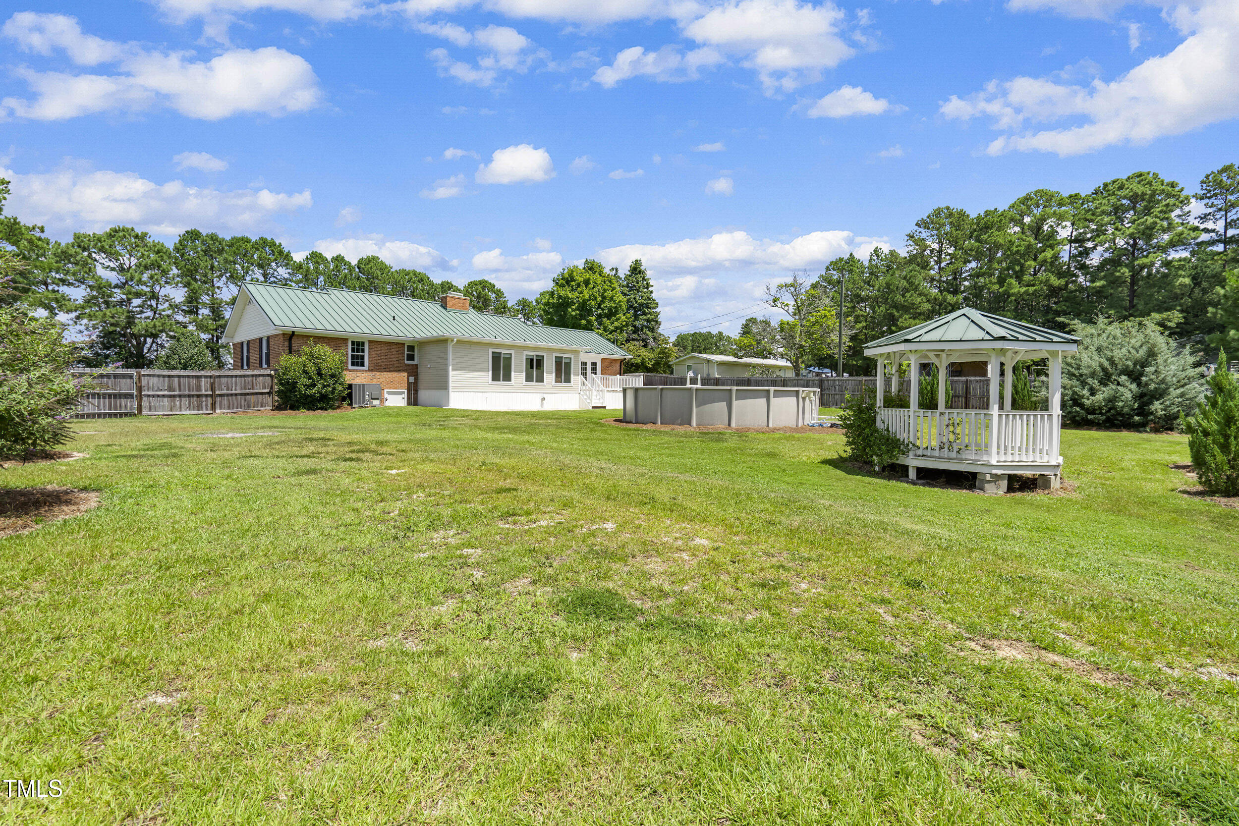 771 Brown Road Lillington, NC 27546 - Photo 35 of 37 a view of a house with a big yard