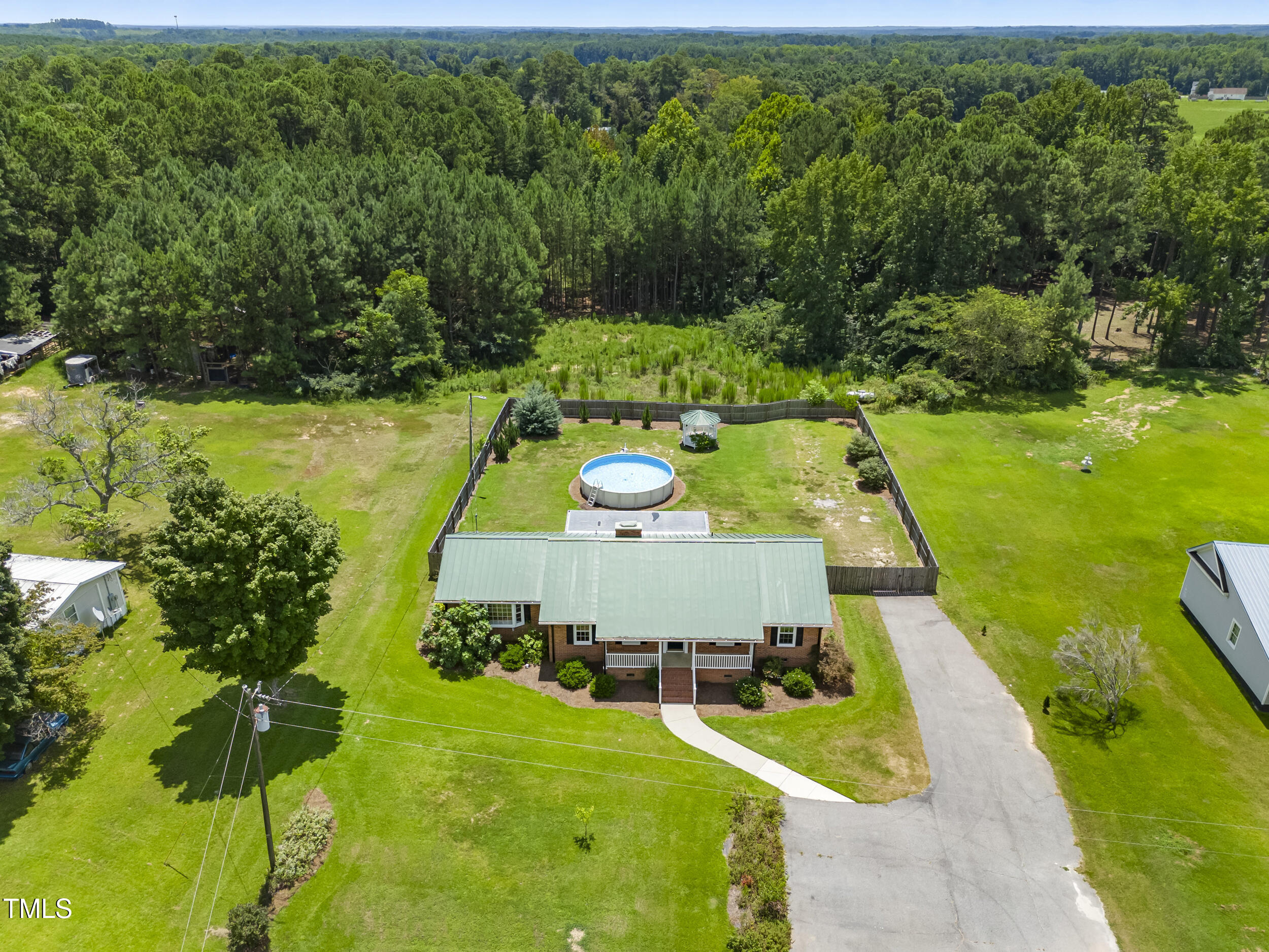 771 Brown Road Lillington, NC 27546 - Photo 3 of 37 a view of a yard with chairs