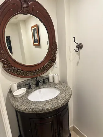 a bedroom with bed and tv