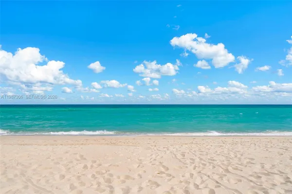 a view of a golf course with a lake