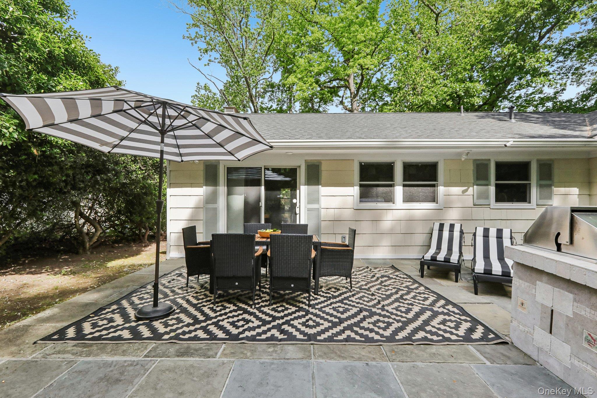 62 Mohegan Road Larchmont, NY 10538 - Photo 4 of 46 an outdoor space with furniture