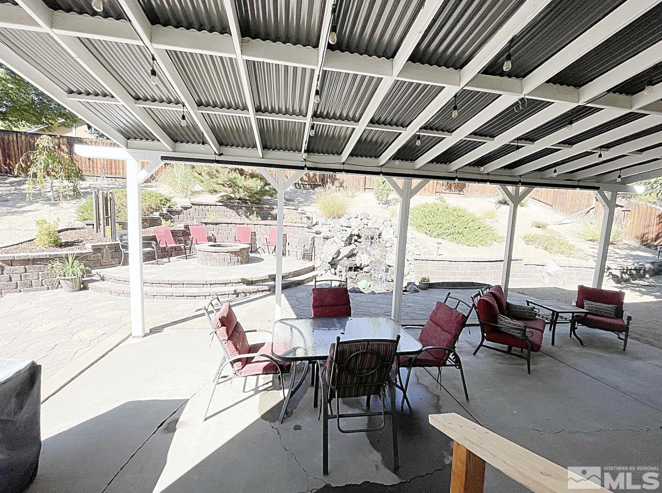 1677 Catherine Way Reno, NV 89523 - Photo 3 of 28 a dining room with furniture water view and balcony