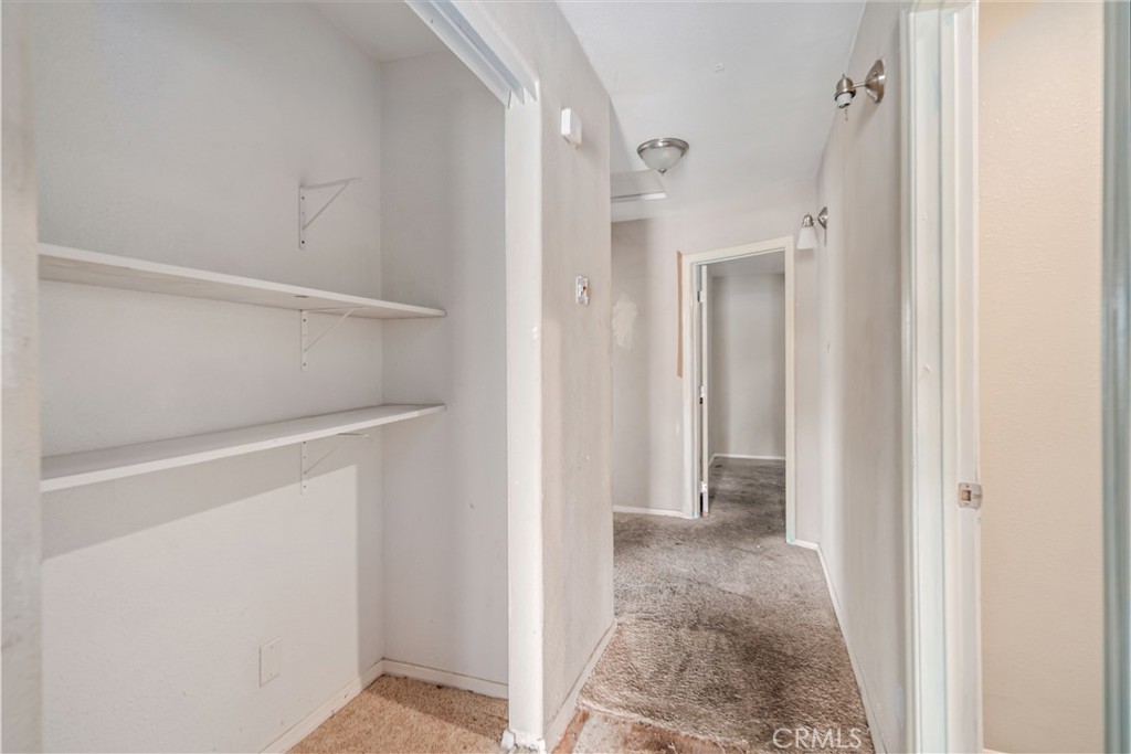 621 East Ave. J Lancaster, CA 93535 - Photo 14 of 25 a view of a hallway with closet