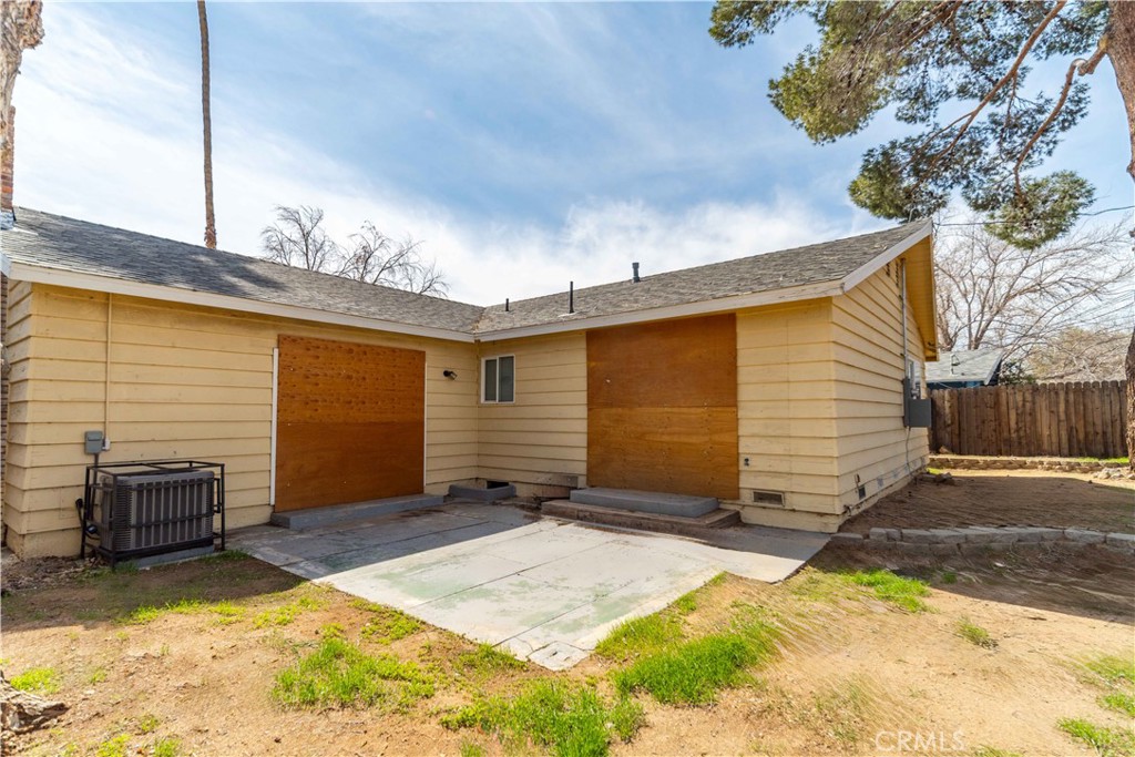 621 East Ave. J Lancaster, CA 93535 - Photo 23 of 25 a view of a backyard with plants
