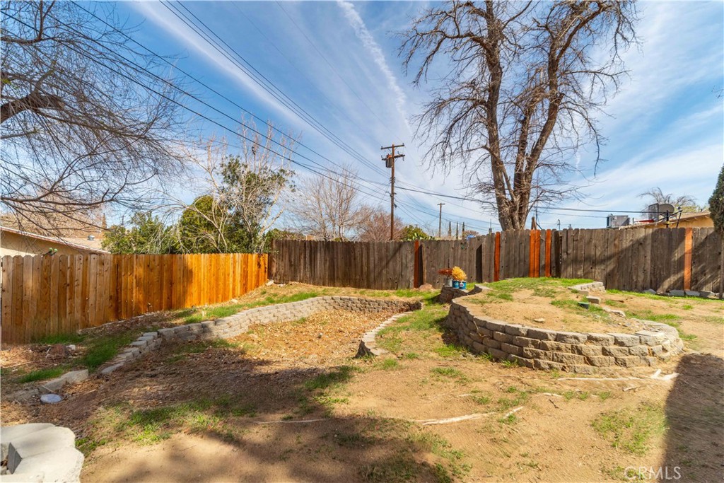 621 East Ave. J Lancaster, CA 93535 - Photo 25 of 25 a view of a backyard of the house