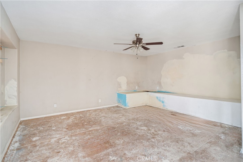 621 East Ave. J Lancaster, CA 93535 - Photo 6 of 25 a view of a big room with carpet