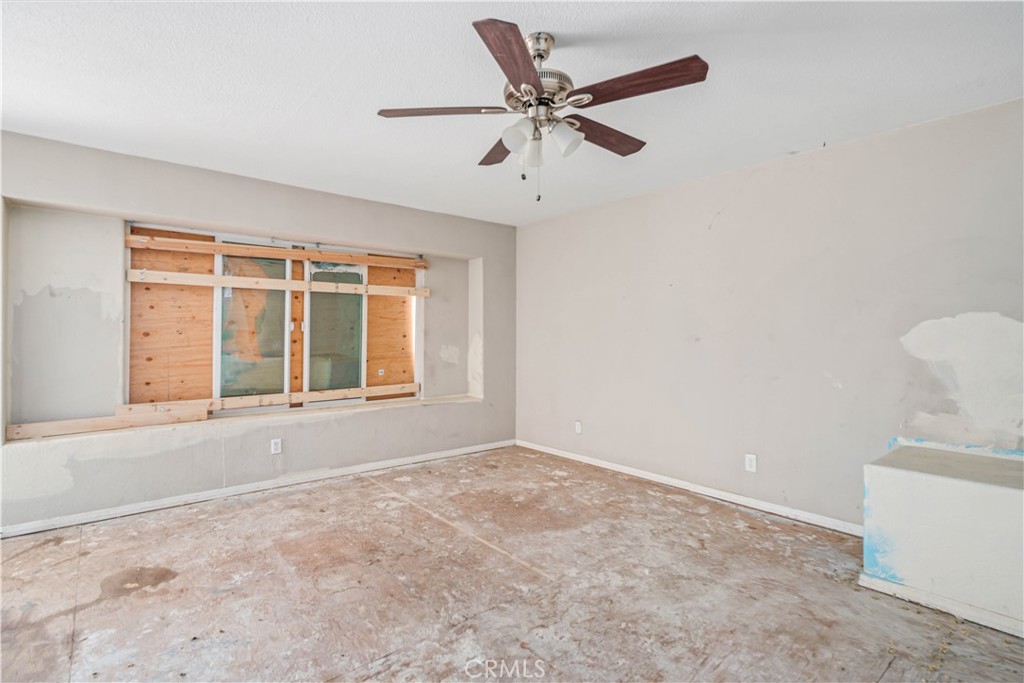621 East Ave. J Lancaster, CA 93535 - Photo 7 of 25 a view of an empty room with a window