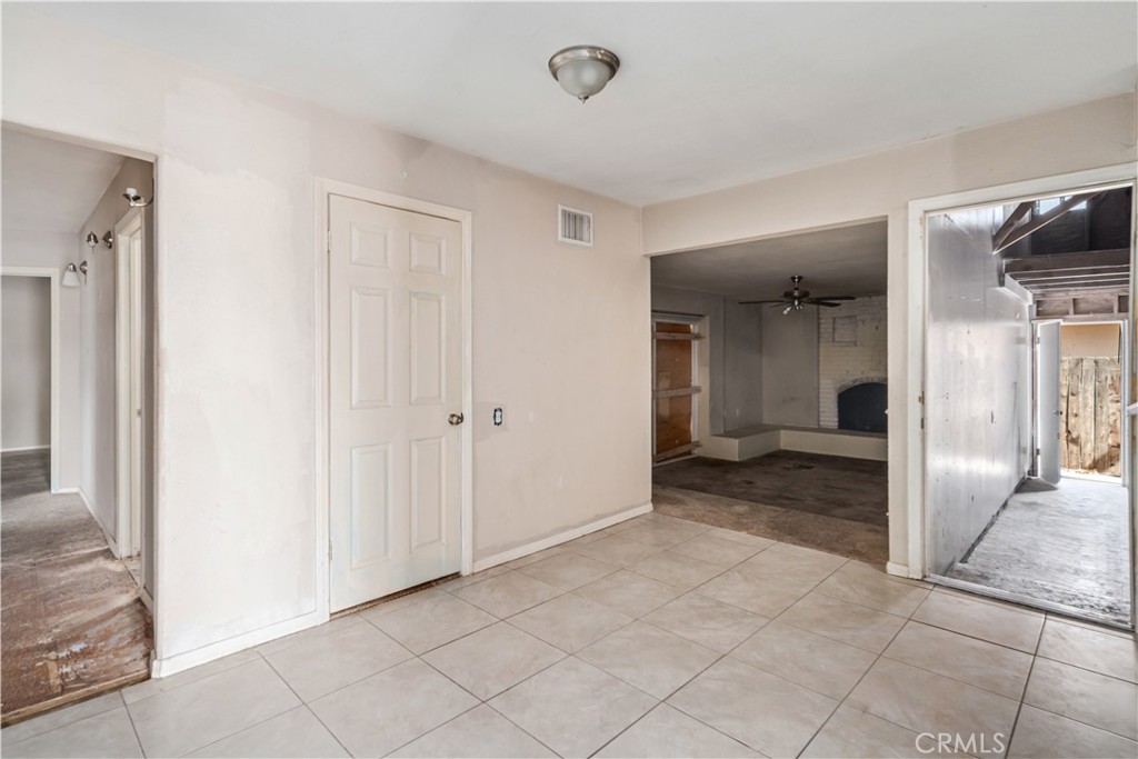621 East Ave. J Lancaster, CA 93535 - Photo 9 of 25 a view of a hallway with closet and bathroom