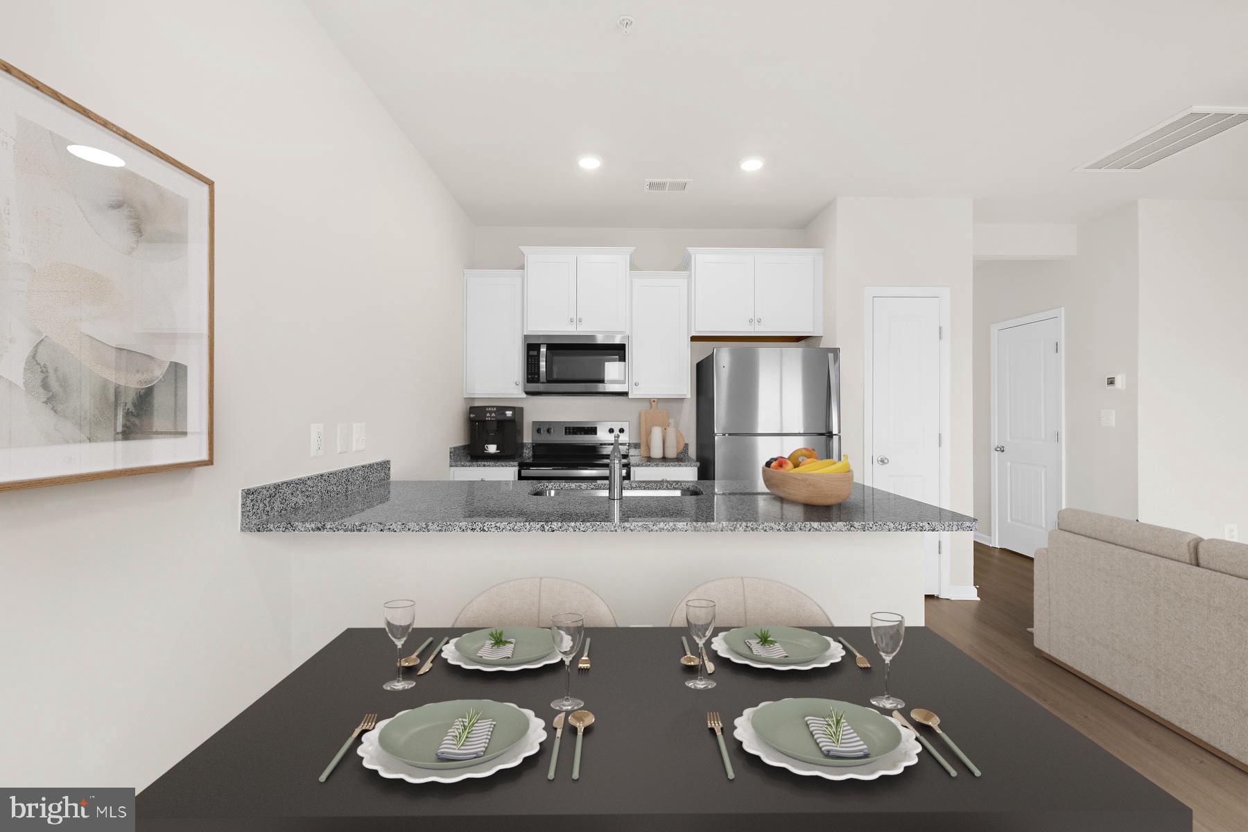 8155 Bartholomew Court Baltimore, MD 21206 - Photo 4 of 13 Dining Room & Kitchen