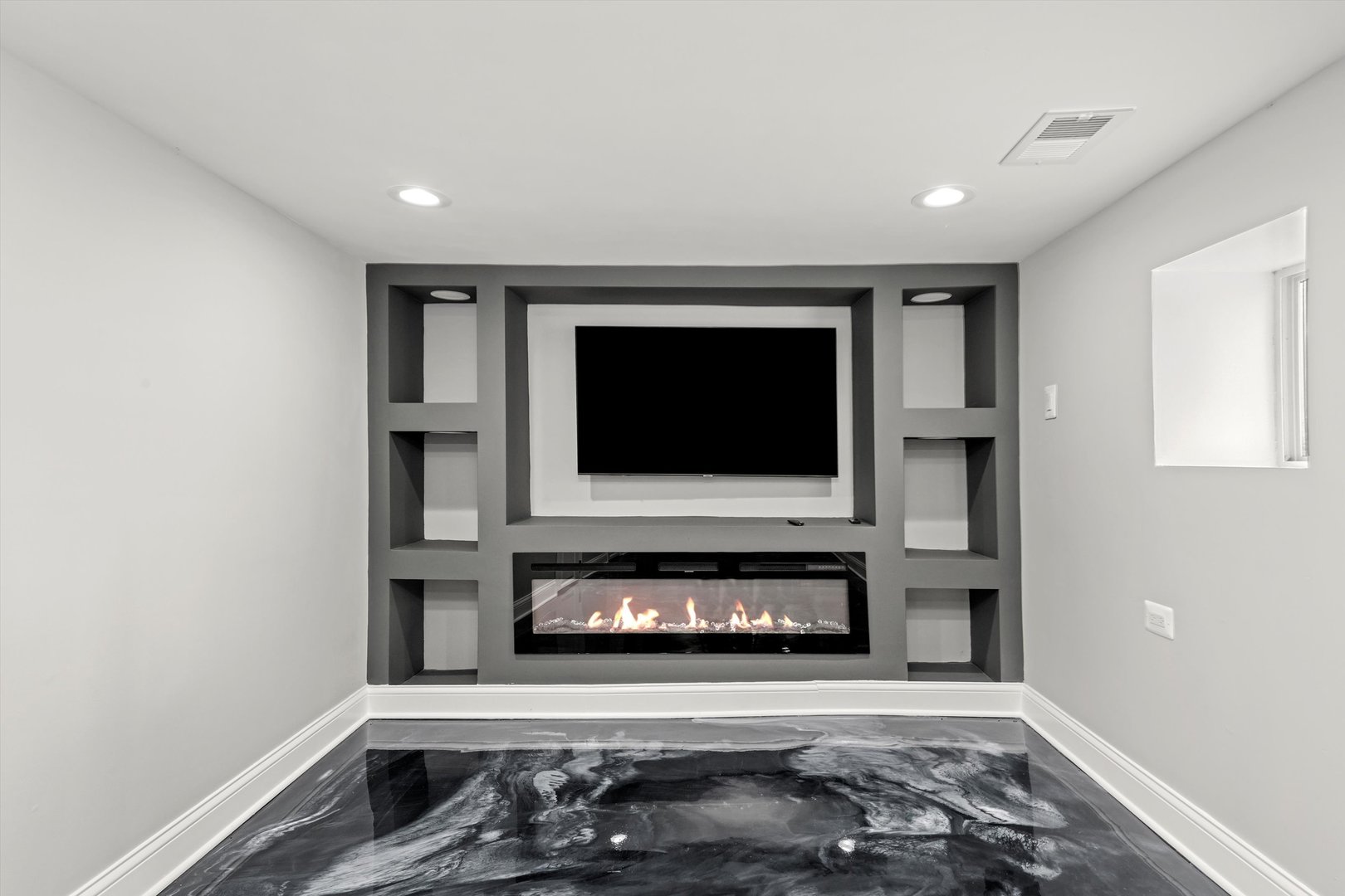 7918 South Anthony Avenue Chicago, IL 60619 - Photo 19 of 34 a living room with furniture and a fireplace