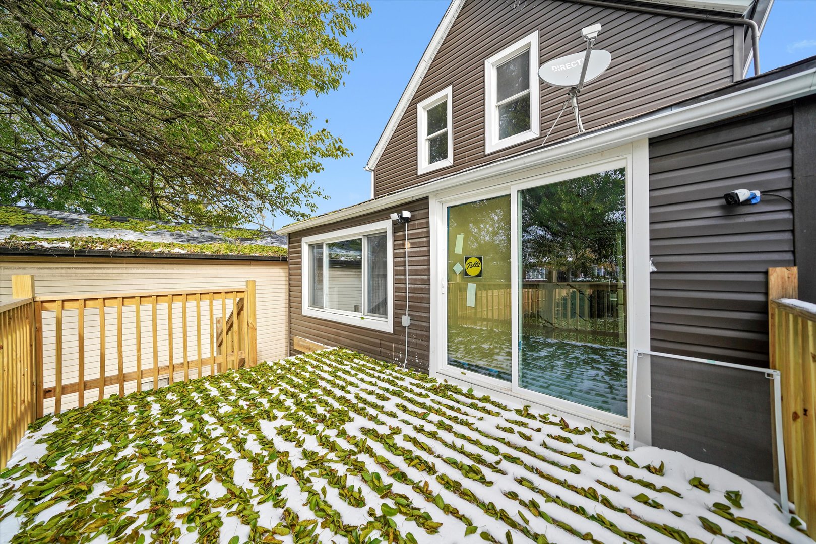 7918 South Anthony Avenue Chicago, IL 60619 - Photo 31 of 34 a front view of a house with a garden