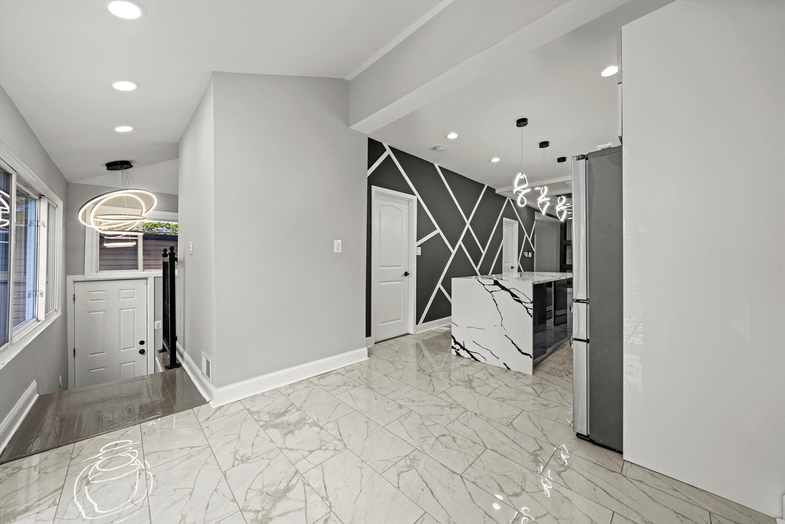 7918 South Anthony Avenue Chicago, IL 60619 - Photo 4 of 34 a view of a livingroom with a staircase