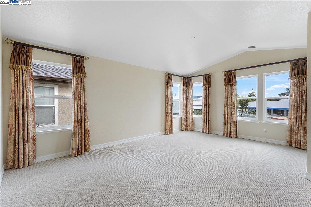 3 Cerruti Court Alameda, CA 94501 - Photo 12 of 22 a view of an empty room with a window