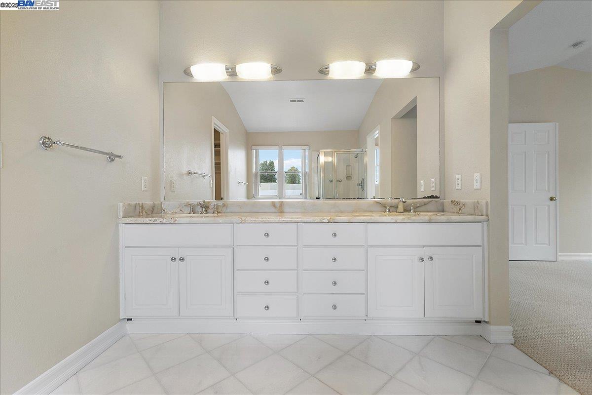 3 Cerruti Court Alameda, CA 94501 - Photo 16 of 22 a bathroom with a granite countertop sink mirror and double